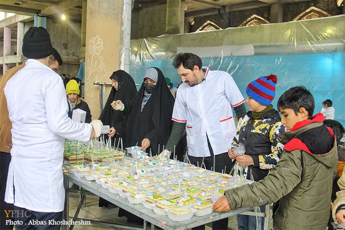 پخت و توزیع کیک ۳۱۳ متری همزمان با نیمه شعبان