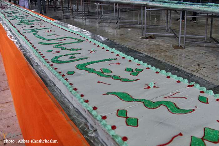 پخت و توزیع کیک ۳۱۳ متری همزمان با نیمه شعبان